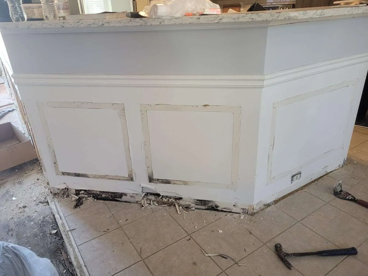 Water damage and mold on kitchen during Storm Damage Restoration in Millstone